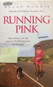 Cover of Pink Running, showing Deborah De Williams and her dog running along an Australian country road.